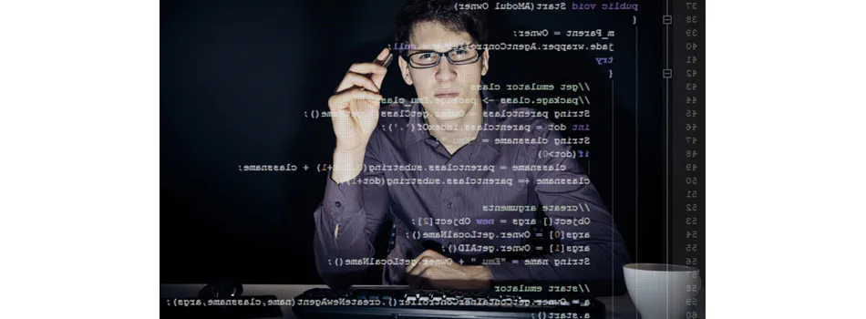 computer programmer thinking and staring at code